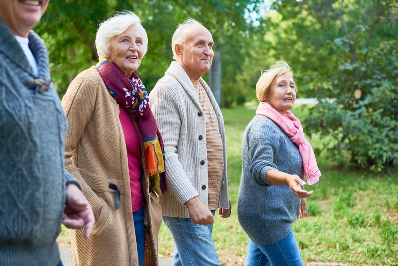 People walking together at a park.